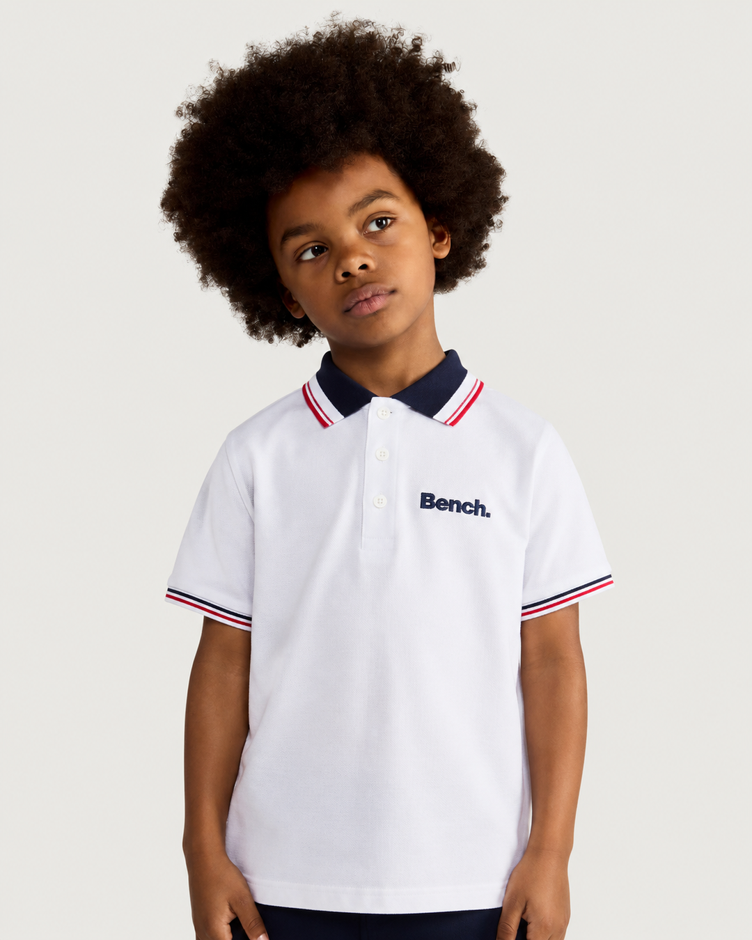 BENCH boys white knit polo and blue shorts
